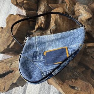 Authentic Christian Dior denim Trope L’oeil saddle bag.